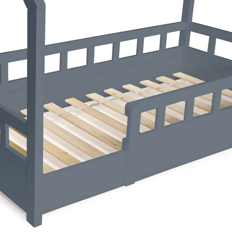 Lit cabane gris avec barrière