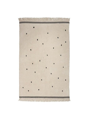 Tapis écru à pois noirs