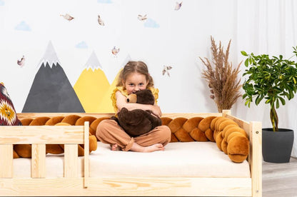 Peuterbed met barrière en opberglade
