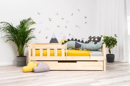 Peuterbed met barrière en opberglade