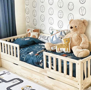 Letto per bambini con cassetto e barriera